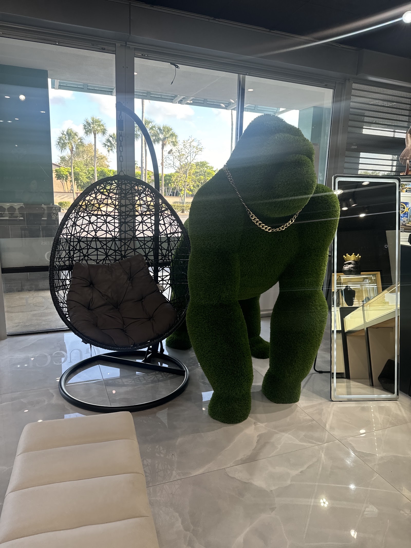 The green grass gorilla that greets customers at the Mint Jewelers entrance